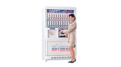 An automatic vending machine for cans where the product is taken from a high position
